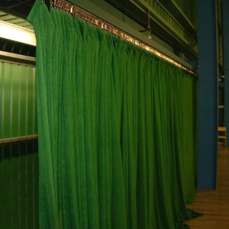 Indoor archery netting system with a freestanding frame, designed to catch stray arrows during practice sessions.