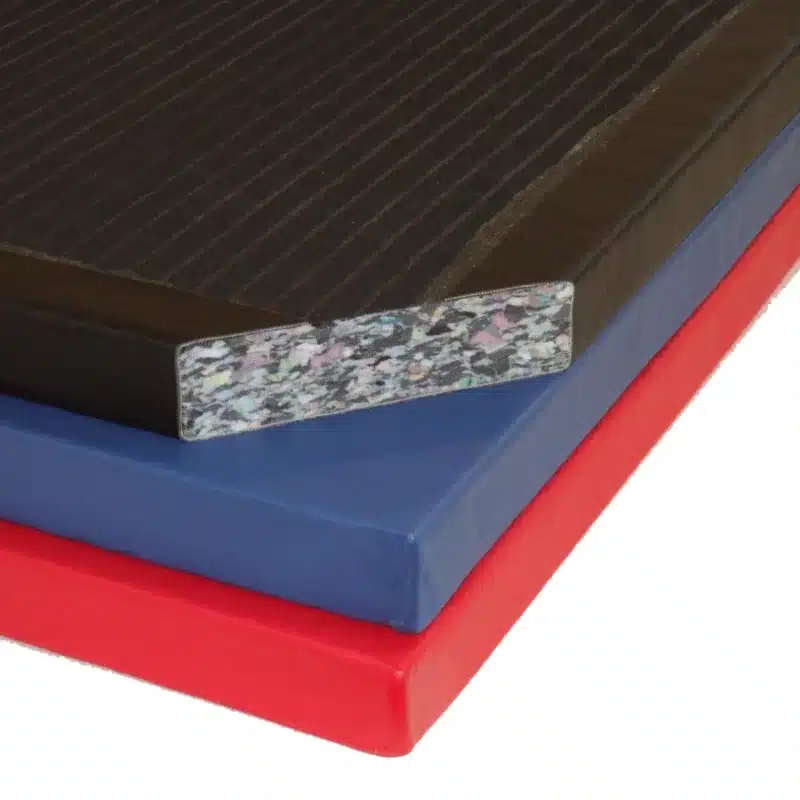 Close-up of Multi Purpose Gym Mat showing a dense 12lb chip foam core with bonded PVC cover and latex anti-slip base.